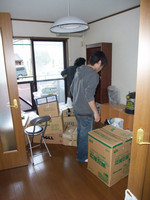 勞
